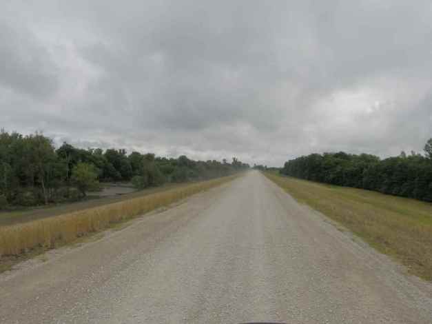 Hwy 465 – a gravel one-lane road on top of a levee?