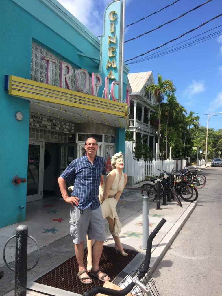 Posing with Marilyn outside the Tropic Cinema