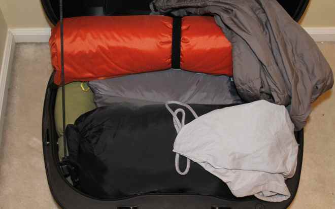 Top Case Pack includes Sleeping Bag, Tent, Mattress Pad, Pillow, Jacket Liner, Extra Visor (in grey pouch)